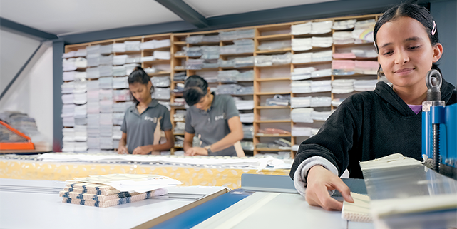 Women sending fabric samples to customers