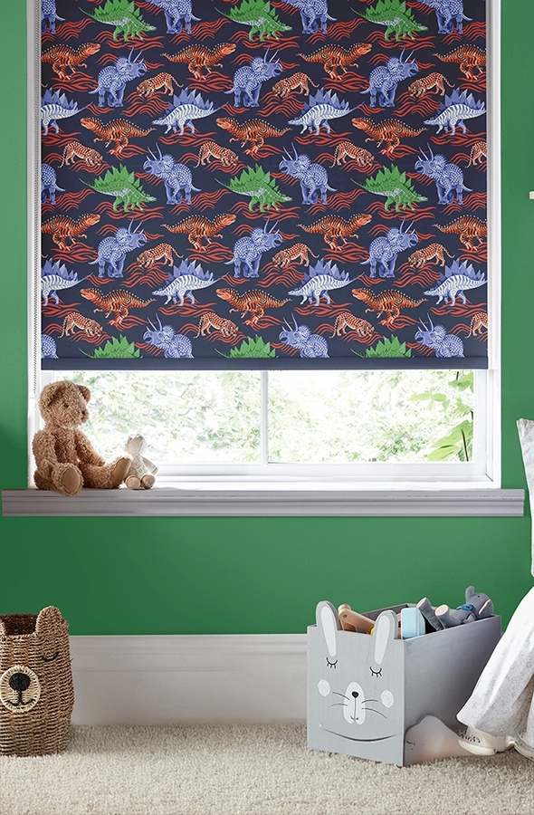 Room with navy blue dinosaur design roller blind for kids from Cath Kidston