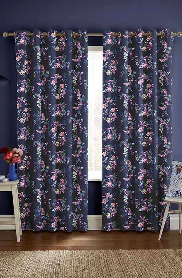 Room with navy flower design curtains from Cath Kidston