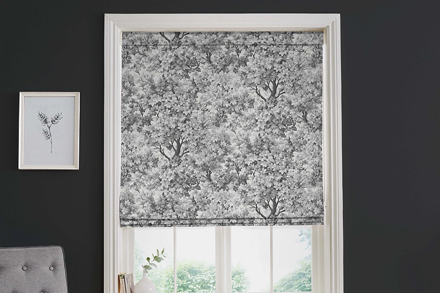 Room with grey floral roman blind from Graham & Brown