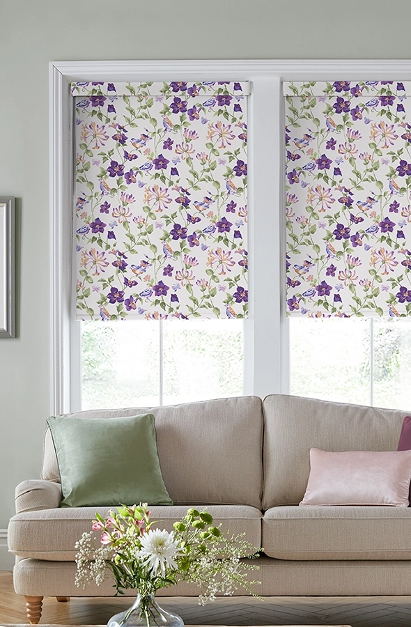 Room with violet flower design roman blind from Laura Ashley