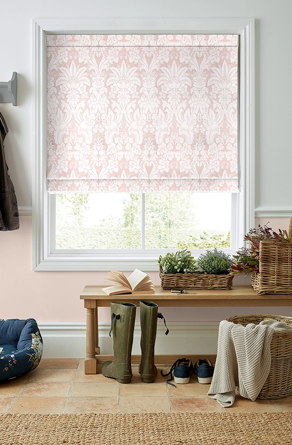 Room with white geometric design roman blind from Laura Ashley Collection