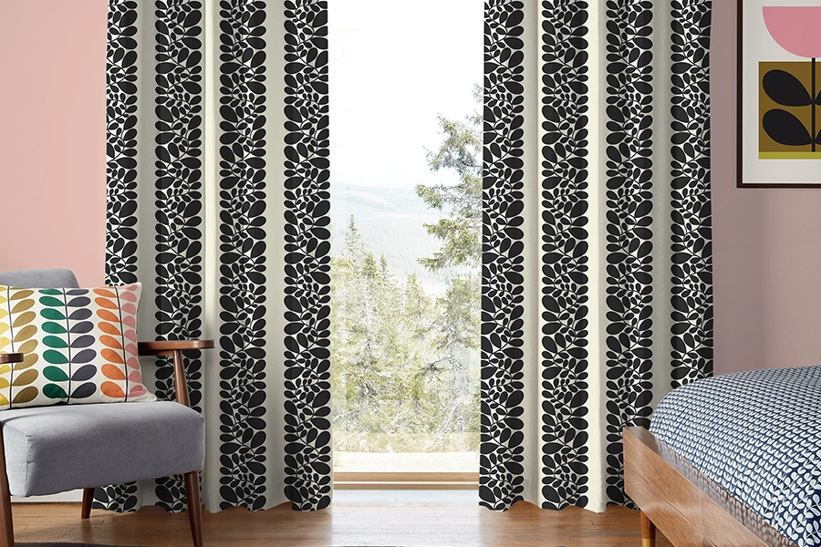 Room with black flower stripes curtains from Orla Kiely
