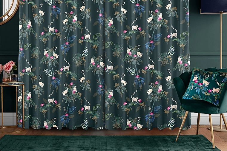 Room with green lemur design curtains from Sara Miller