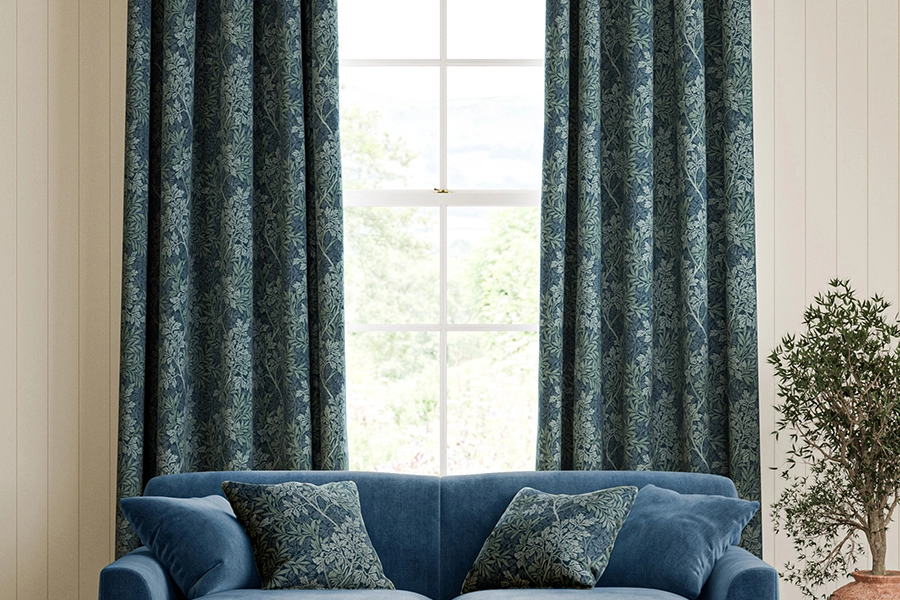 Room with purple floral curtains from William Morris at Home