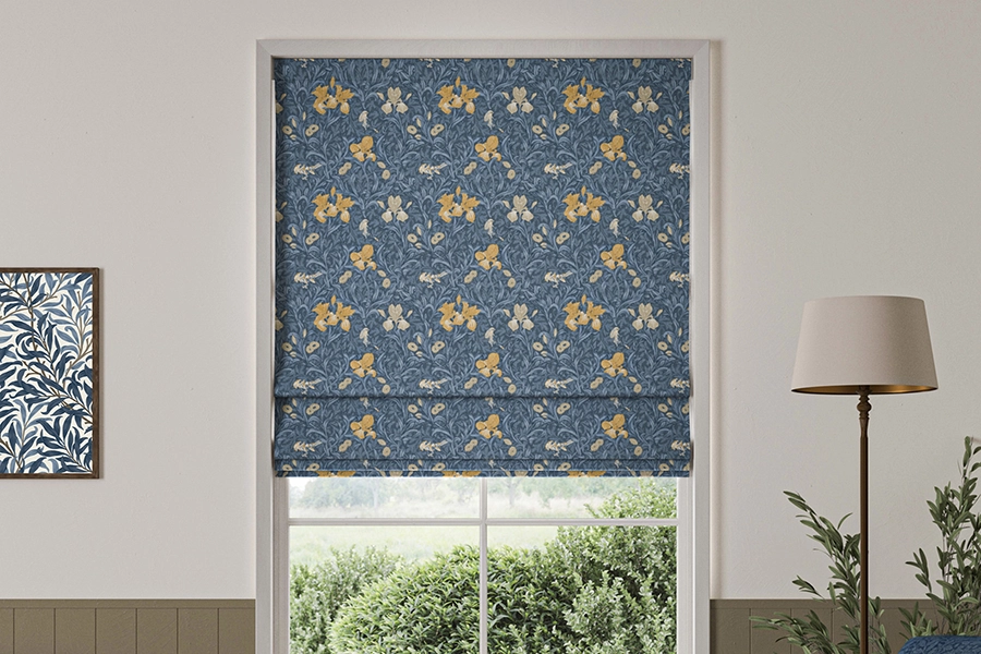 Room with purple roman blind illustrating irises from William Morris at Home