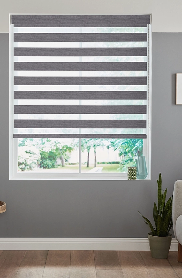 Room with grey geometric day and night blind form illumin8 Fifty50™ Collection