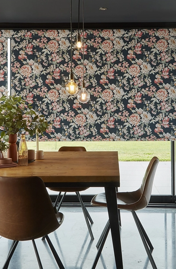 Room with orange flowers on dark background design roller blind from illumin8 Simply™ Roller Collection