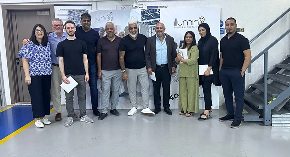 illumin8 team celebrating achievements of the business