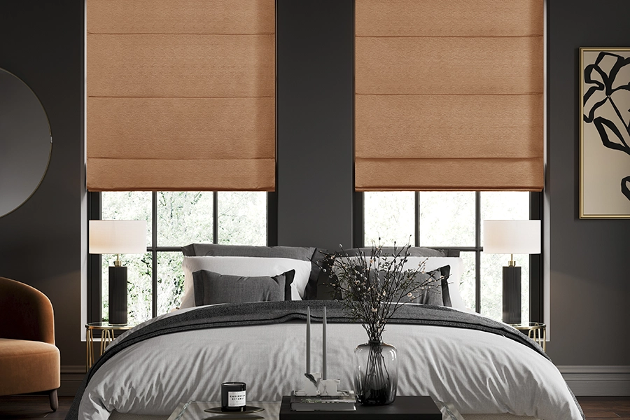 Bedroom with light orange roman blinds from illumin8