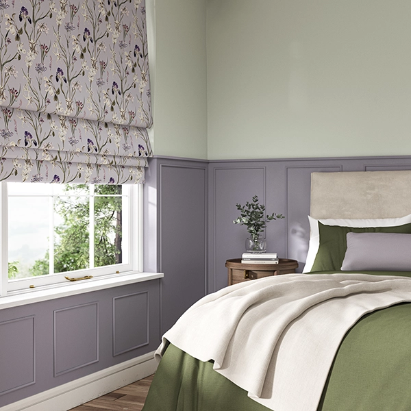 Room with purple floral roman blinds from illumin8