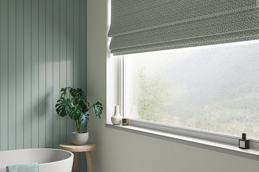 Room with teal floral roman blinds from illumin8