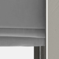 Roman blinds with cascading fabric