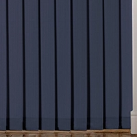 Vertical blinds with sewn in weights